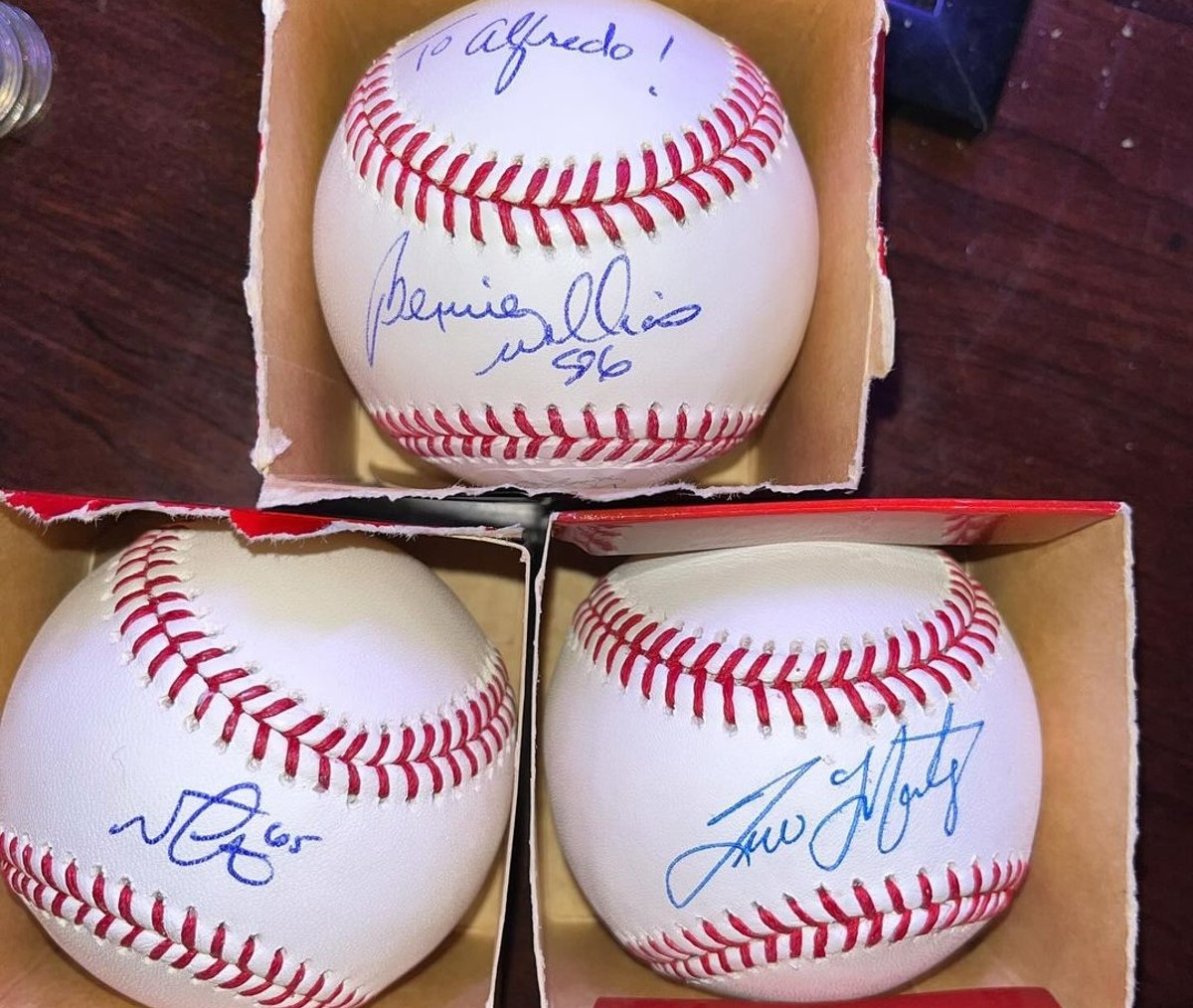 Baseballs signed by Yankees pitching stars.