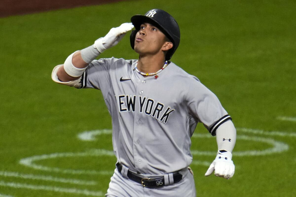 New York Yankees’ Oswaldo Cabrera celebrates as he crosses home plate on a solo home run off Pittsburgh Pirates relief pitcher Thomas Hatch during the eighth inning of a baseball game in Pittsburgh, Saturday, Sept. 16, 2023.
