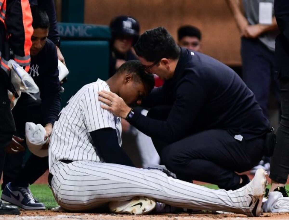 Yankees OF Oscar Gonzalez reacts after a hit causing orbital fracture on March 25, 2024 in Mexico City.