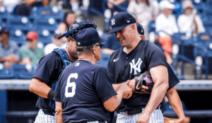 Former Yankees player Joe Torre with Carlos Rodon