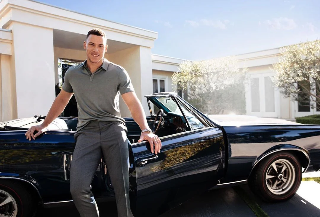 Aaron Judge, New York Yankees outfielder, next to his car