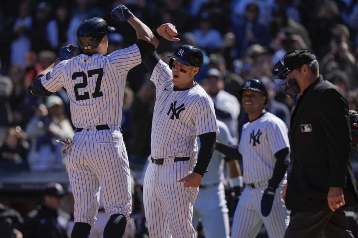 Anthony Rizzo and Giancarlo Stanton celebrate following the Yankees' 8-3 win over the Blue Jays at Yankee Stadium on April 7, 2024.