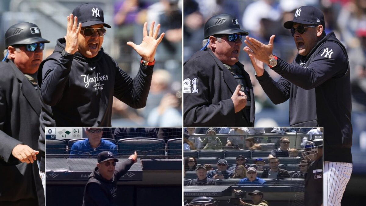 Aaron Boone protesta por su expulsión injusta y señala al aficionado que gritó al árbitro Wendelstedt causando esto en el Yankee Stadium el 22 de abril de 2024.