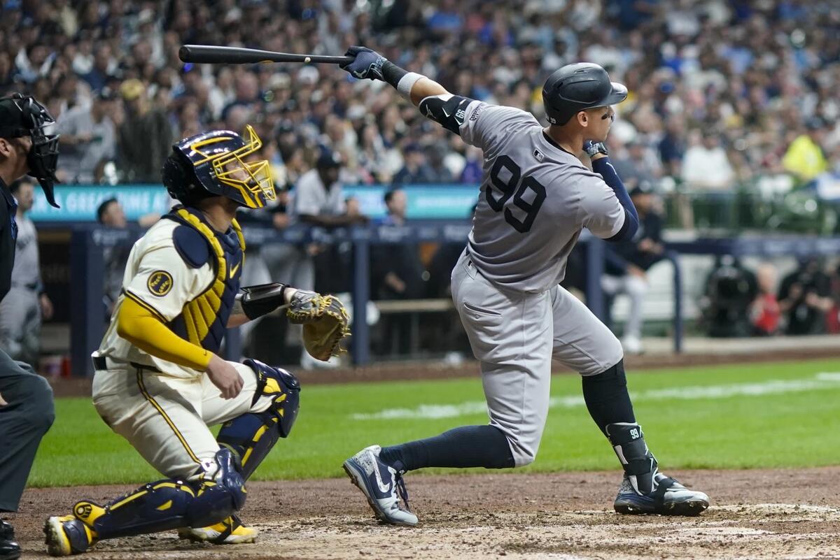 New York Yankees’ Aaron Judge hits a two-run home run during the sixth inning of a baseball game against the Milwaukee Brewers Saturday, April 27, 2024, in Milwaukee.