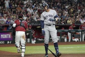 A dejected Aaron Judge leaves plate after umpire makes questionable strikeout call in Chase Field, Phoenix, AZ, on April 2, 2024.