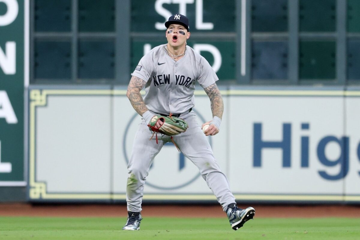 HOUSTON, TEXAS - MARCH 31: Alex Verdugo #24 of the New York Yankees reacts after catching a fly ball for the final out of the game against the Houston Astros at Minute Maid Park on March 31, 2024 in Houston, Texas. 