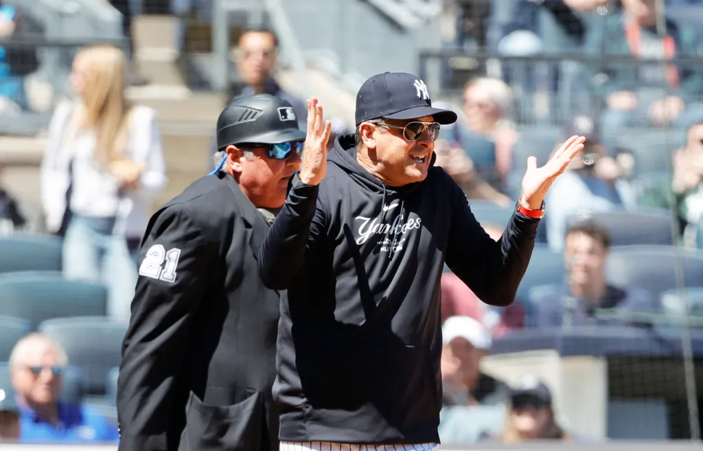 Hunter Wendelstedt, the umpire, ejects Aaron Boone, the manager of the New York Yankees, during the first inning of the game against the Oakland Athletics at Yankee Stadium on April 22, 2024. The stadium is located in the Bronx, New York, USA