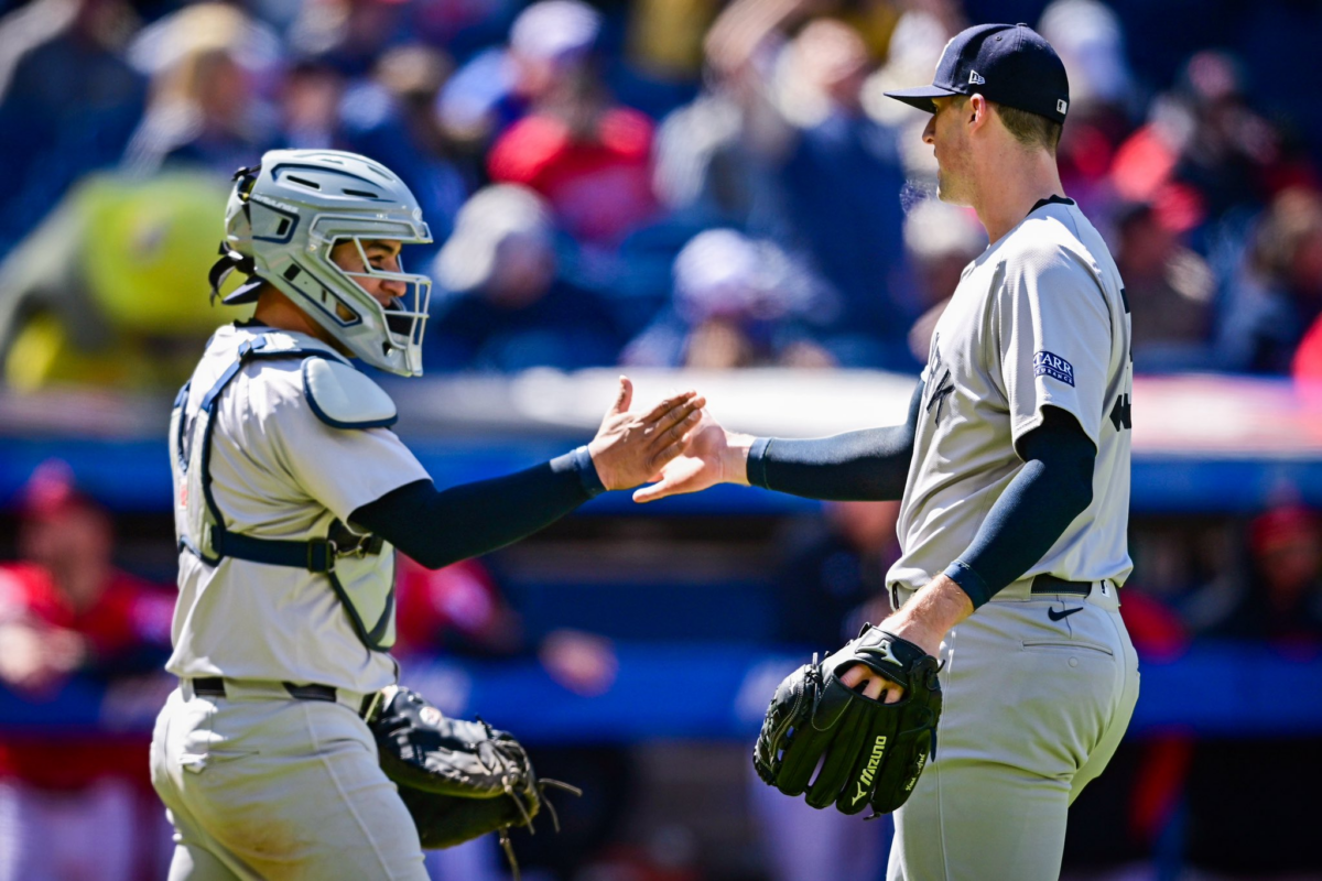 Jugadores de los New York Yankees: Clarke Schmidt y Jose Trevino