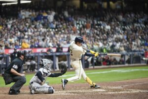 Milwaukee Brewers’ Joey Ortiz hits a two-run home run during the second inning of a baseball game against the New York Yankees Friday, April 26, 2024, in Milwaukee.