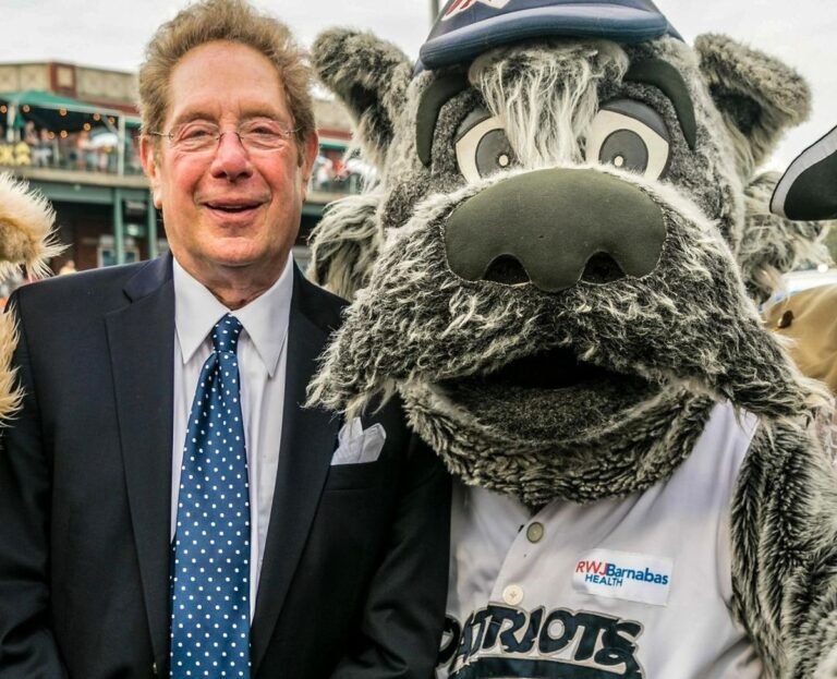 John Sterling is with the mascot of Yankees' Double-A affiliate the Somerset Patriots.