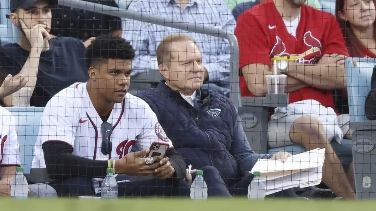 n:Juan Soto, current player of the New York Yankees, standing with his agent Scott Boras during his time with the Washington Nationals