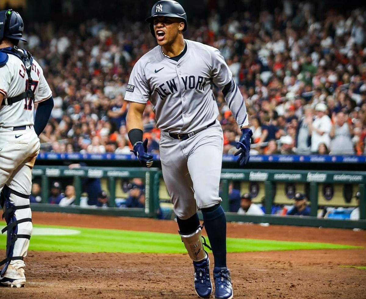 Yankees' Juan Soto celebrates following a hit against the Astros in Houston on March 31, 2024.
