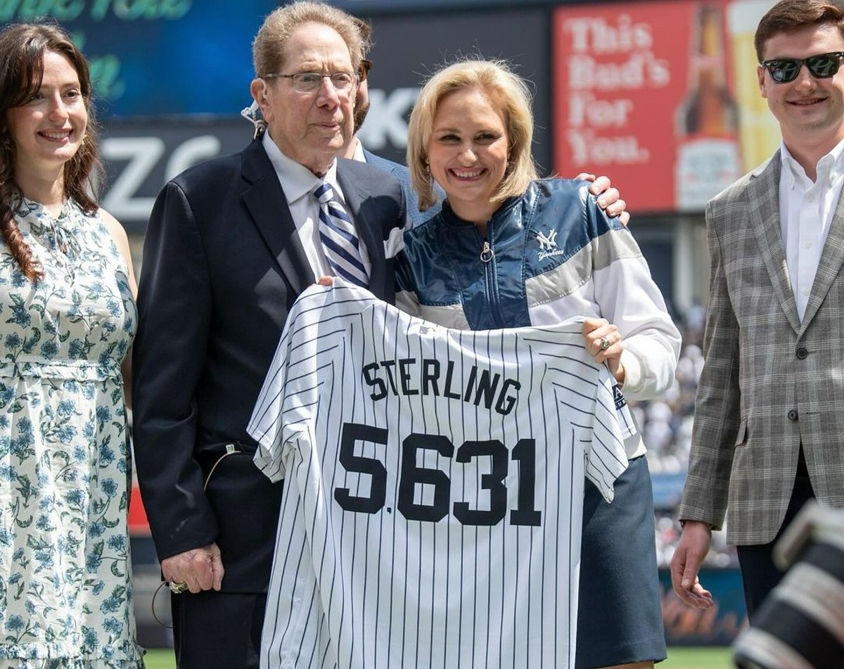 John Sterling is presented a Yankees shirt at Yankee Stadium during his farewell on April 20, 2024.