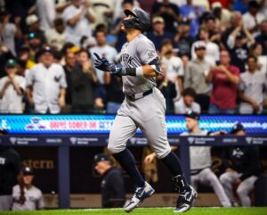 New York Yankees’ Aaron Judge celebrates after hitting a two-run home run during the sixth inning of a baseball game against the Milwaukee Brewers Saturday, April 27, 2024, in Milwaukee.