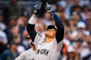 Yankees' Juan Soto signals to sky after hitting a home run against the San Diego Padres, May 24, 2024, in San Diego.