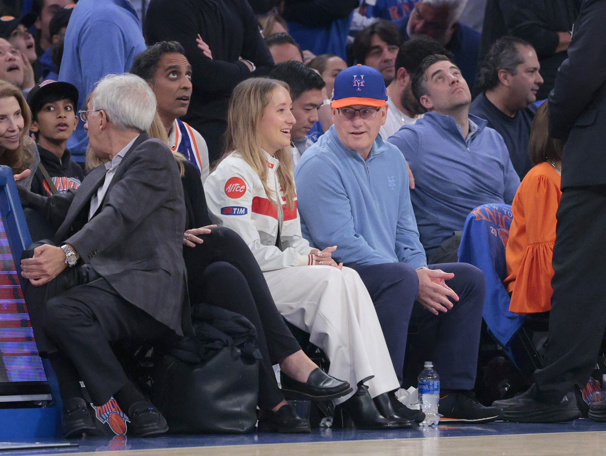 New York Mets owner Steve Cohen sits on celebrity row during the first quarter.