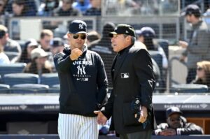Yankees' manager Aaron Boone arguing with Angel Hernandez during his ejection on April 7, 2024
