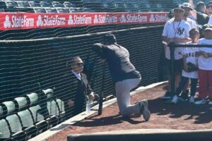 Yankees manager Aaron Boone talks with Juan Soto's agent Scott Boras at Angel Stadium on May 29, 2024.