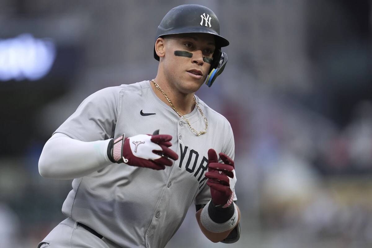 New York Yankees’ Aaron Judge runs the bases after hitting a solo home run against the Minnesota Twins during the first inning of a baseball game Wednesday, May 15, 2024, in Minneapolis.