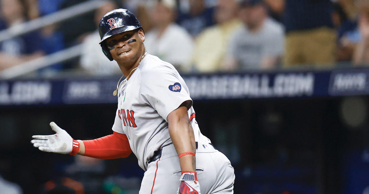 ST PETERSBURG, FLORIDA - MAY 20: Rafael Devers #11 of the Boston Red Sox reacts after hitting a two run home run during the third inning against the Tampa Bay Rays continuing his home run streak to six games in a row at Tropicana Field on May 20, 2024 in St Petersburg, Florida.