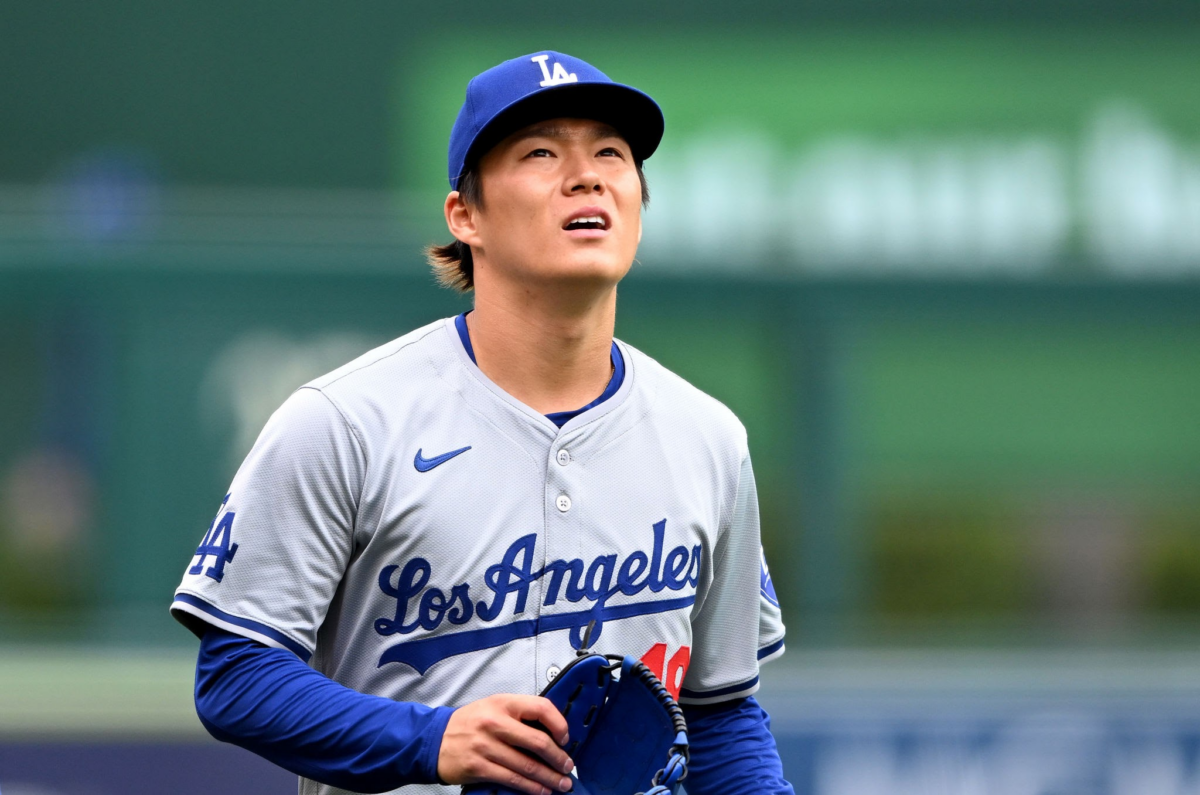 WASHINGTON, DC - APRIL 25: Yoshinobu Yamamoto #18 of the Los Angeles Dodgers walks in from the bullpen before the game against the Washington Nationals at Nationals Park on April 25, 2024 in Washington, DC. 