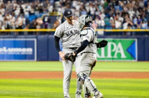 Jose Trevino congratulates Clay Holmes after his save helped the Yankees win over the Rays on May 10, 2024, in Tampa Bay.