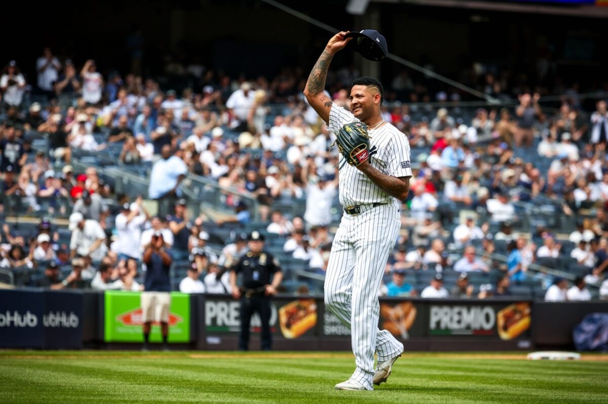 New York Yankees pitcher Luis Gil reacts to a standing ovation after pitching against the Seattle Mariners at Yankee Stadium Thursday, May 23, 2024, in New York.