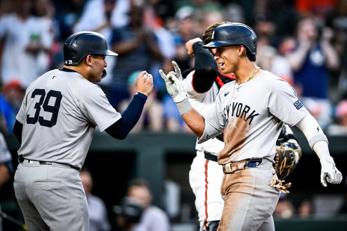 Yankees' Oswaldo Cabrera and Jose Trevino celebrate after the former hits a two-run homer against the Orioles in Baltimore on May 1, 2024.