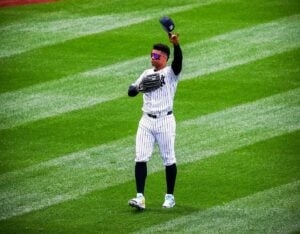 Juan Soto responds to a roll call by fans during his first Yankees game at Yankee Stadium on April 5, 2024.