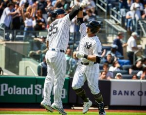 Yankees' Jose Trevino and John Berti celebrate after the latter's home run against the White Sox at Yankee Stadium on May 19, 2024.