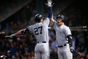 Yankees' Aaron Judge and Giancarlo Stanton celebrate after the former's home run against the Giants in San Francisco on June 1, 2023.