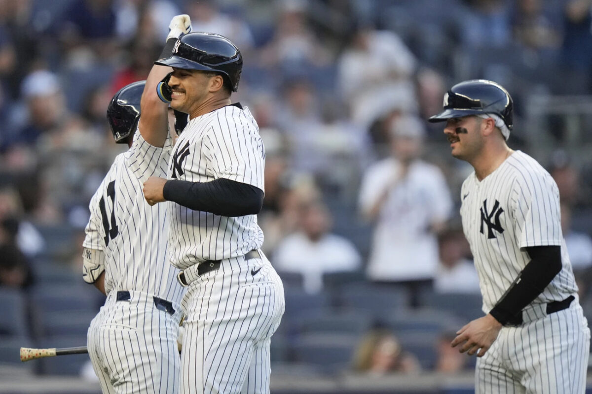 New York Yankees’ Trent Grisham, center, celebrates with teammates after hitting a two-run home run against the Minnesota Twins during the second inning of a baseball game Thursday, June 6, 2024, in New York.