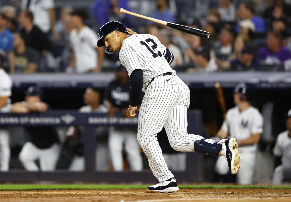 New York Yankees’ Trent Grisham tosses his bat after hitting a home run against the Los Angeles Dodgers during the sixth inning of a baseball game, Sunday, June 9, 2024, in New York.