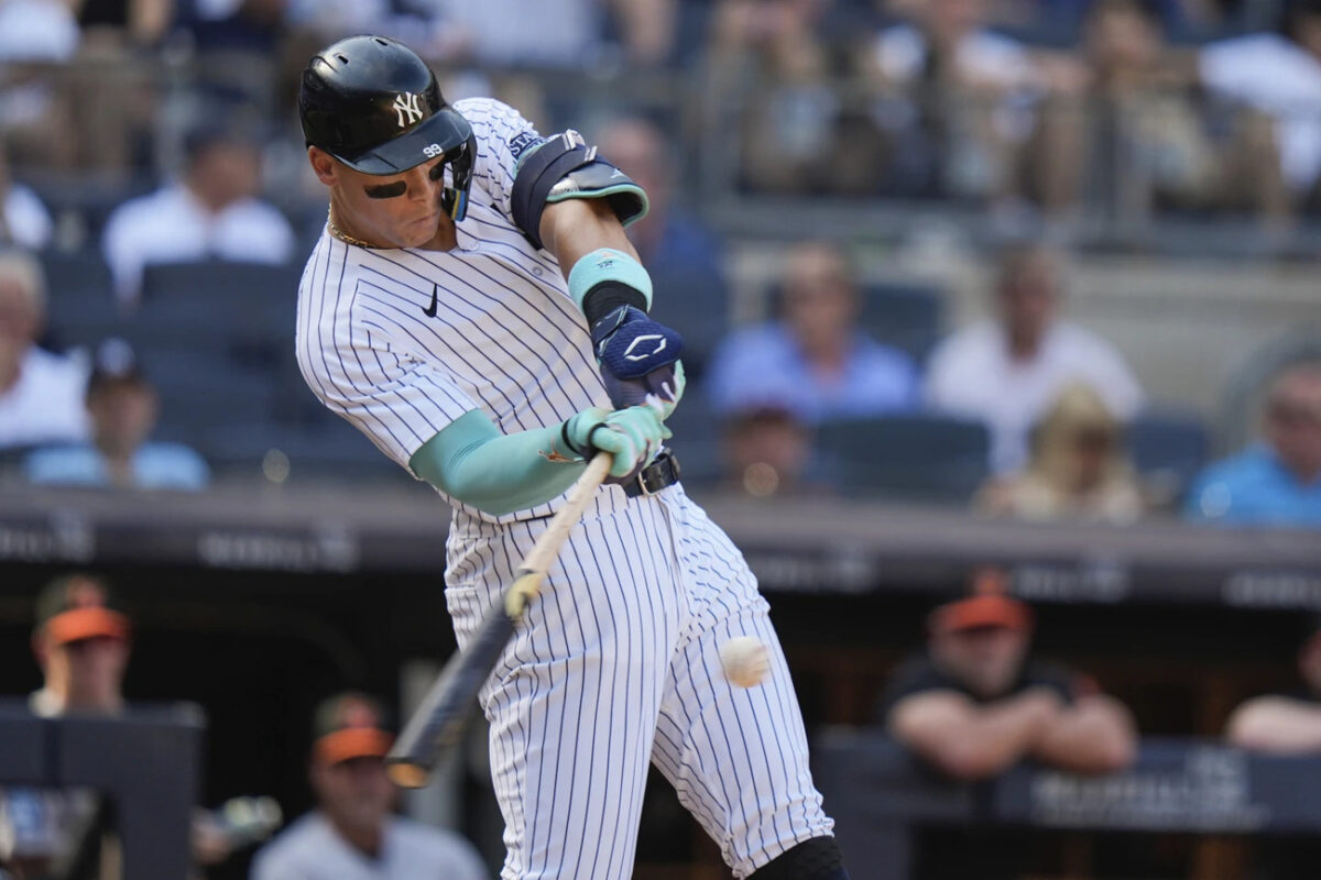New York Yankees’ Aaron Judge hits a two-run home run during the third inning of a baseball game against the Baltimore Orioles, Thursday, June 20, 2024, in New York.