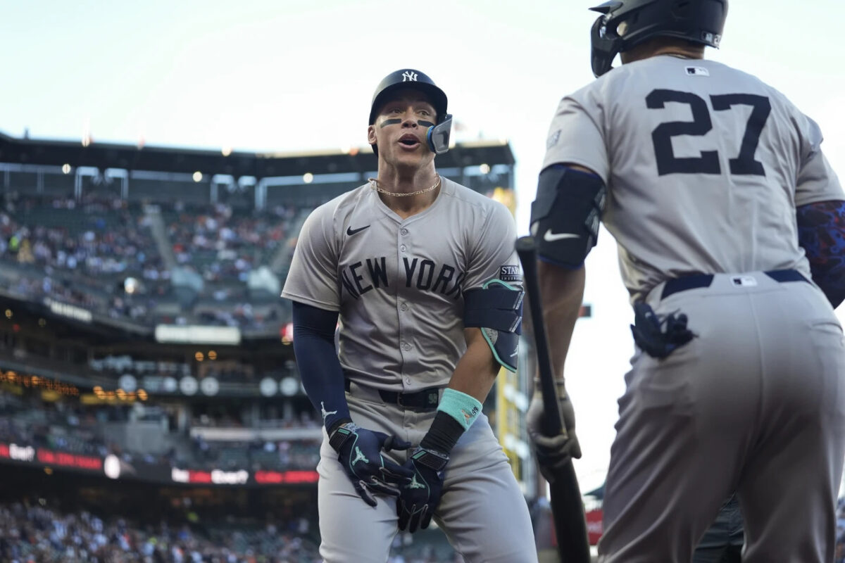 New York Yankees’ Aaron Judge, left, celebrates after hitting a two-run home run against the San Francisco Giants during the first inning of a baseball game Saturday, June 1, 2024, in San Francisco. 