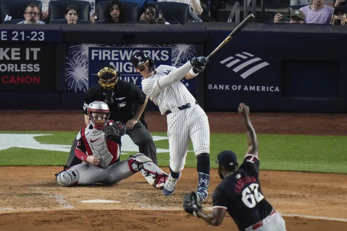 New York Yankees’ Aaron Judge follows through on a two-run triple against the Minnesota Twins during the fifth inning of a baseball game Wednesday, June 5, 2024, in New York.