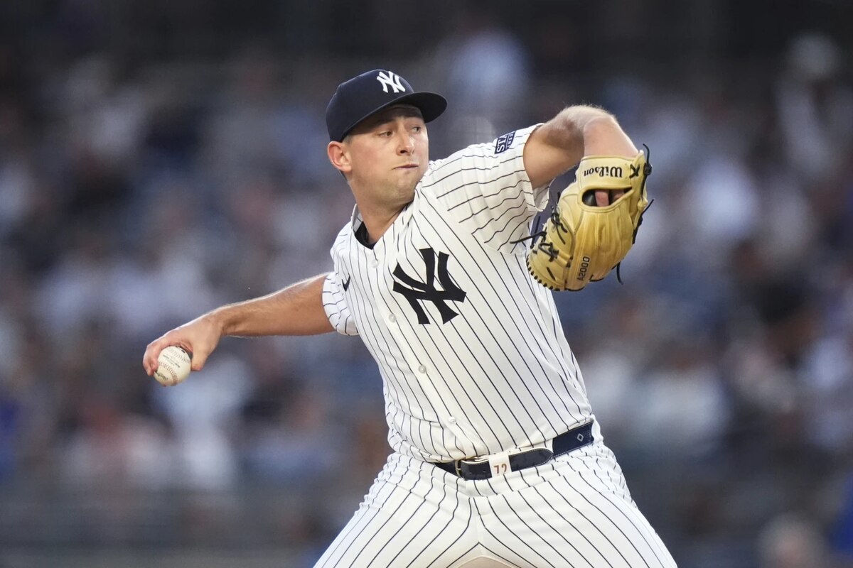 New York Yankees’ Cody Poteet pitches to a Los Angeles Dodgers batter during the first inning of a baseball game Friday, June 7, 2024, in New York.