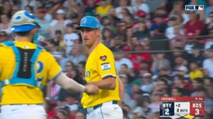 Red Sox's Cooper Criswell wearing the yellow shirt against the Yankees, on June 15, 2024
