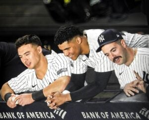 Yankees' shortstop Anthony Volpe with outfielder Juan Soto and backstop Austin Wells at Yankee Stadium on June 4, 2024.