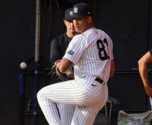 Yankees' pitching coach Matt Blake looks at as Luis Gil is pitching at a bullpen practice at Yankee Stadium before a game on June 10, 2024.