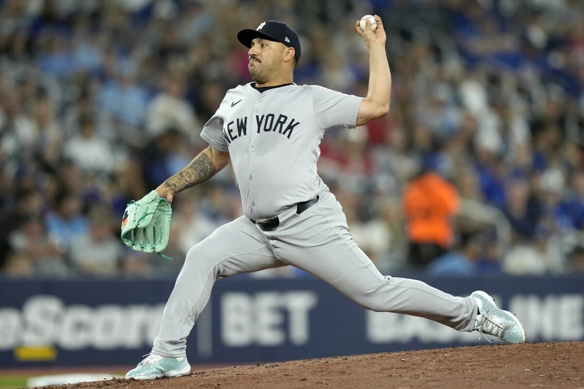 New York Yankees pitcher Nestor Cortes (65) works against the Toronto Blue Jays during the first inning of a baseball game in Toronto, Saturday, June 29, 2024.