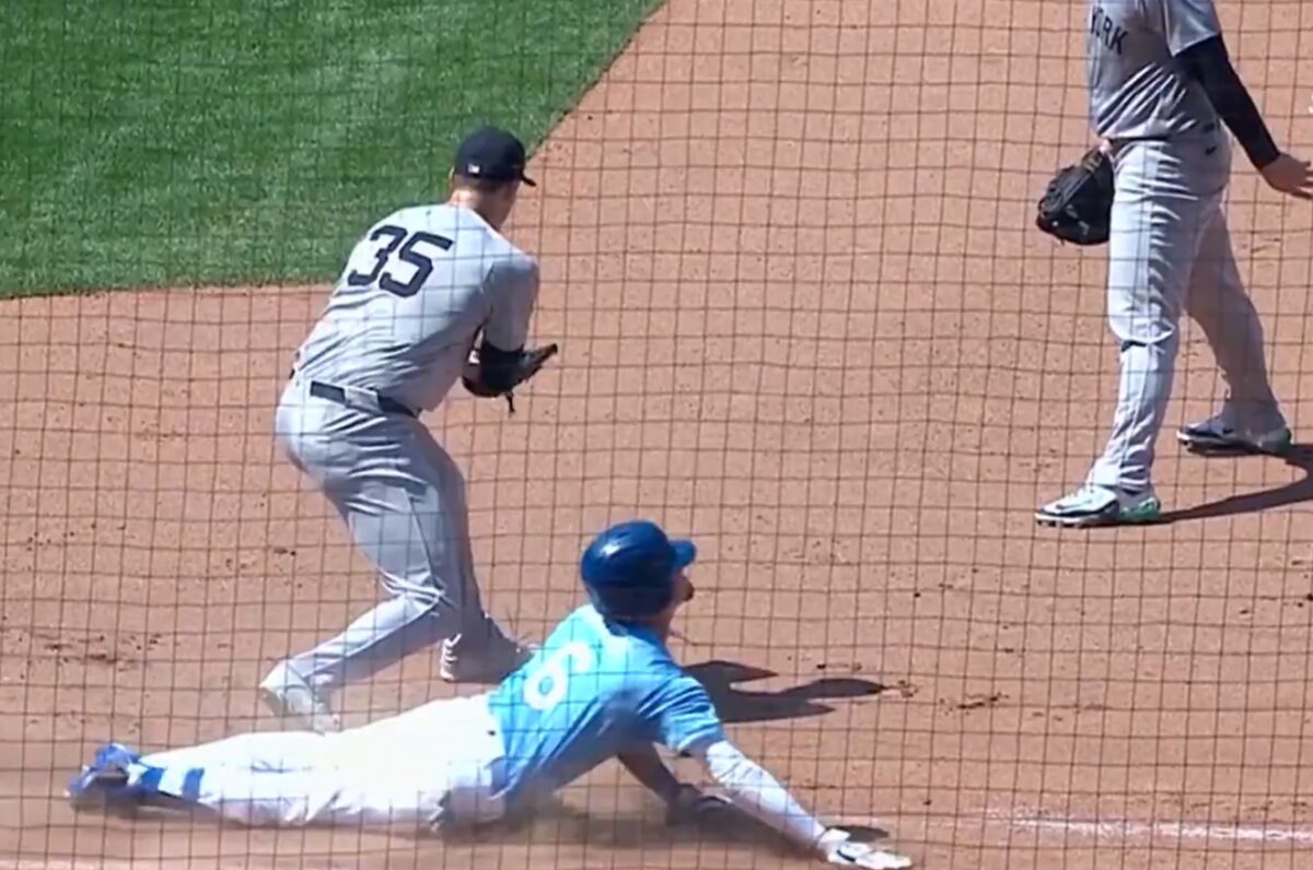 A mistep involving Anthony Rizzo and Clay Holmes allows Royals' Drew Waters to steal a base against the Yankees on June 13, 2024, at Kansasa City.