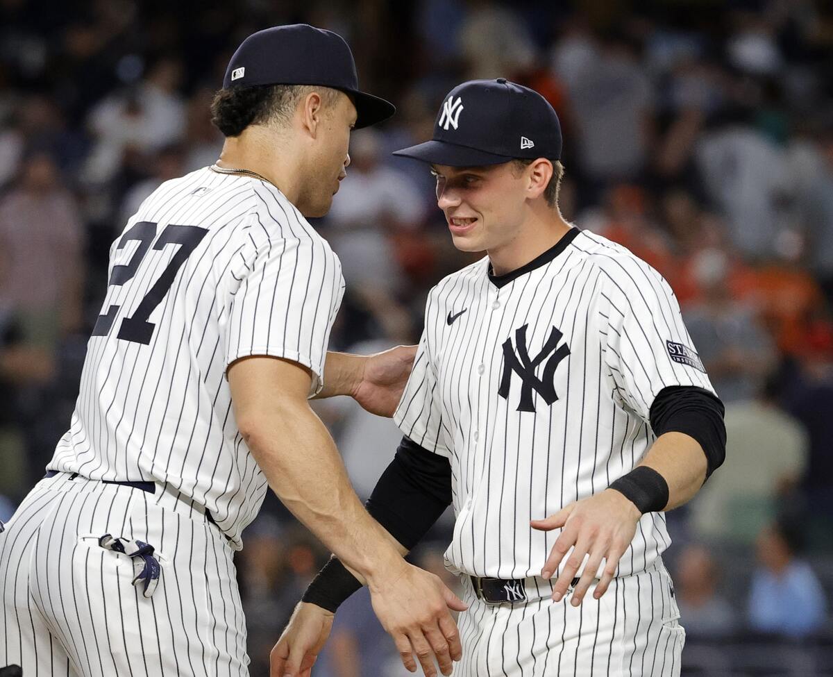 Giancarlo Stanton (left) celebrates with Ben Rice after the Yankees’ win.