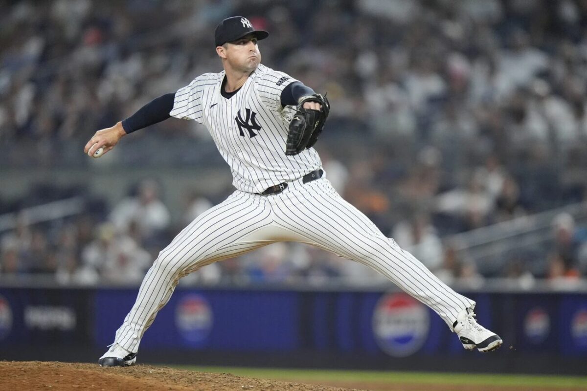 New York Yankees’ Clay Holmes pitches during the ninth inning of a baseball game against the Boston Red Sox, Friday, July 5, 2024, in New York.