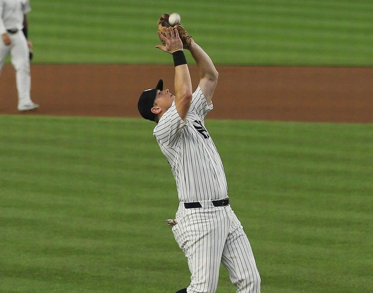 Yankees' DJ LeMahieu makes a defense at Yankee Stadium against the Red Sox on July 7, 2024.