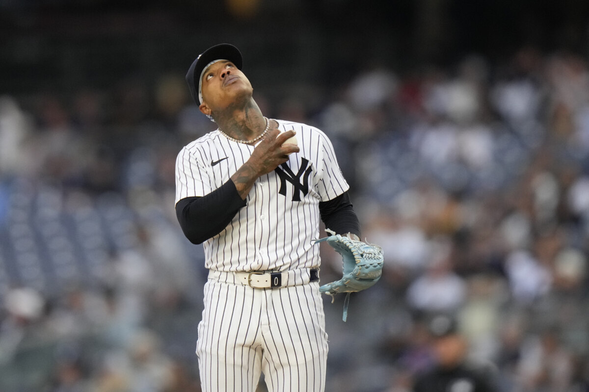 Yankees pitcher Marcus Stroman reacts after surrendering a home run to the Reds in New York on July 4, 2024.