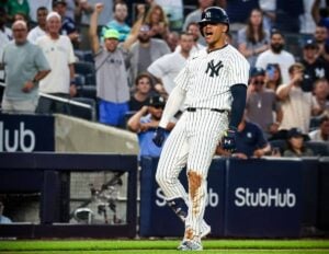 Yankees' Juan Soto reacts after scoring a home run on error against the Rays at Yankee Stadium on July 19, 2024.