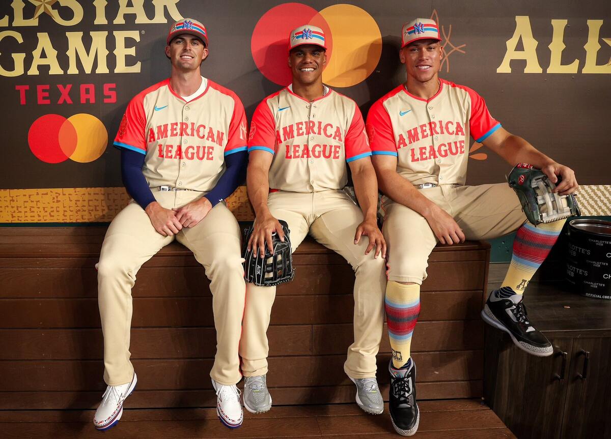 Yankees All-Stars (right to left) Aaron Judge, Juan Soto and Clay Holmes pose for a picture in the dugout before the AL’s All-Star Game victory.