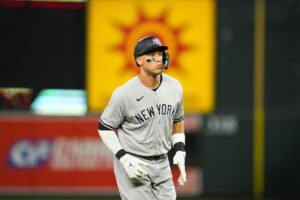 New York Yankees’ Aaron Judge heads to the dugout at the end of the top of the eighth inning of a baseball game against the Baltimore Orioles, Friday, July 28, 2023, in Baltimore. The Orioles won 1-0.