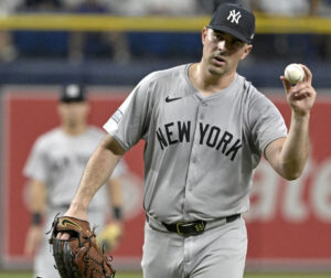 New York Yankees starter Carlos Rodón asks for a new ball during the first inning of a baseball game against the Tampa Bay Rays Tuesday, July 9, 2024, in St. Petersburg, Fla.
